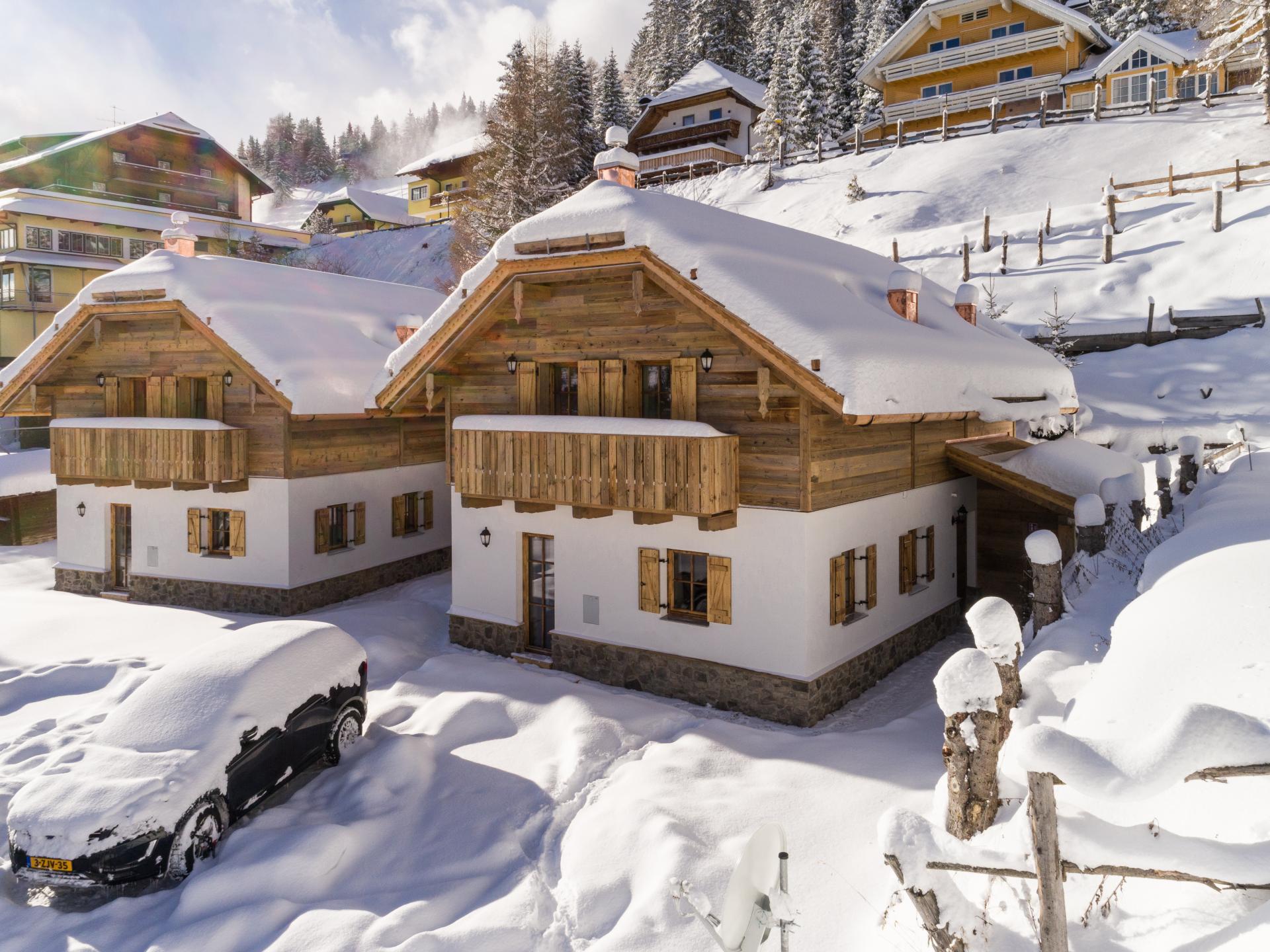Vrijstaande chalets met sauna aan de piste