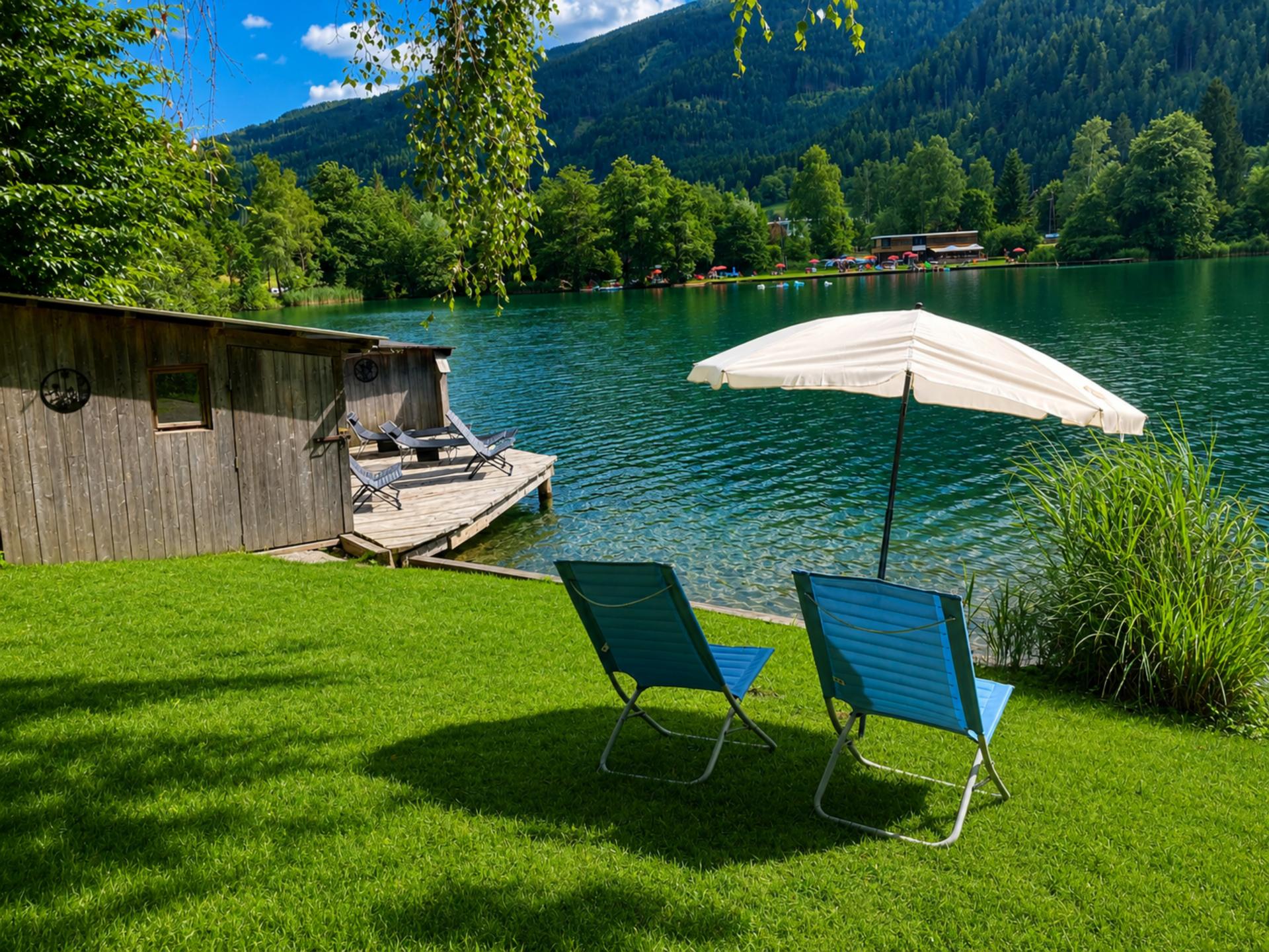 Appartement aan een Alpenmeer met privestrand
