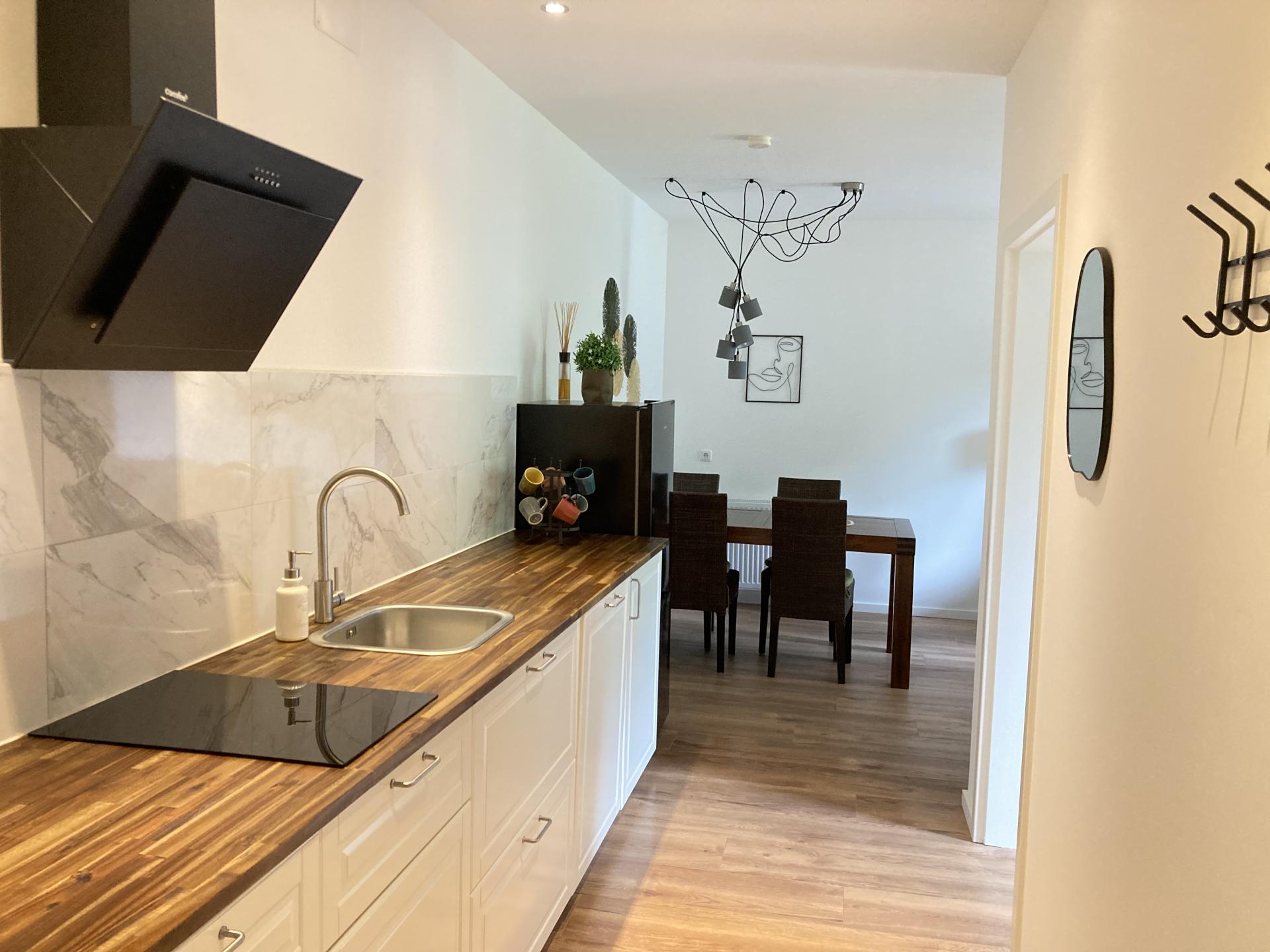 Appartement aan een Alpenmeer met privestrand