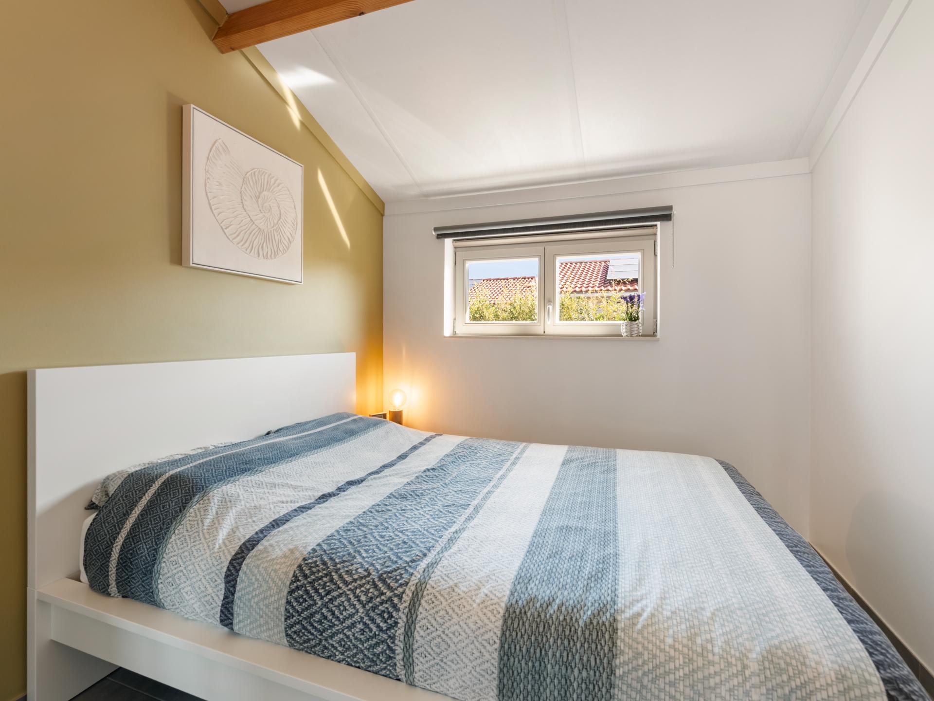 Gezellig vakantiehuis met zongerichte tuin