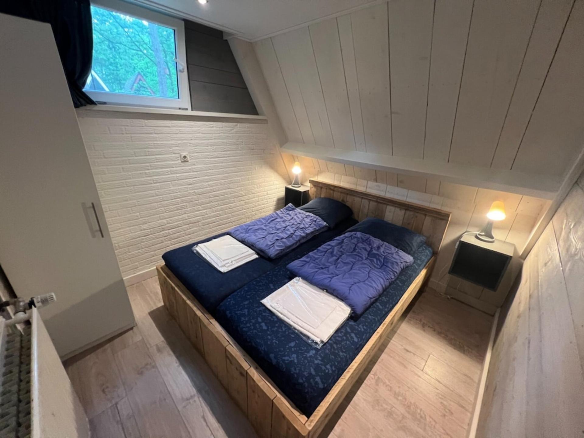 Mooie familie bungalow met sauna in bosgebied